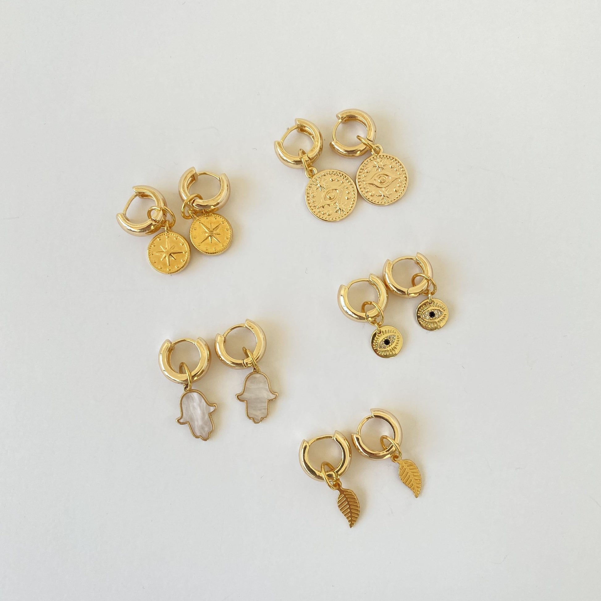 oorbellen creolen goud met bedels